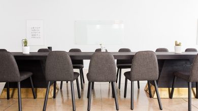 A boardroom conference table in a modern office