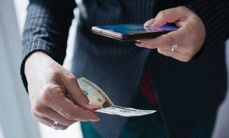 a smartphone showing a crypto wallet app